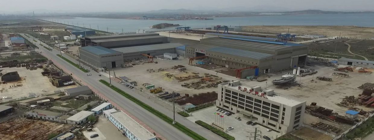Industrial complex near a waterfront.