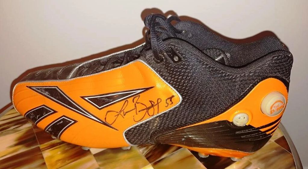 signed Game Worn  Lance Brigg Cleat