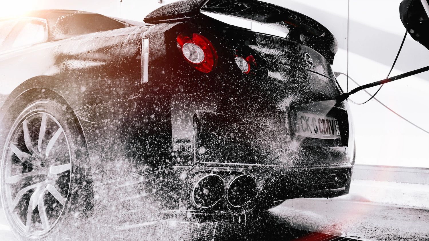 Photo - Black Nissan GTR being washed