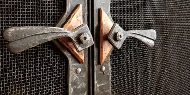 custom designed hardware for fireplace screen doors