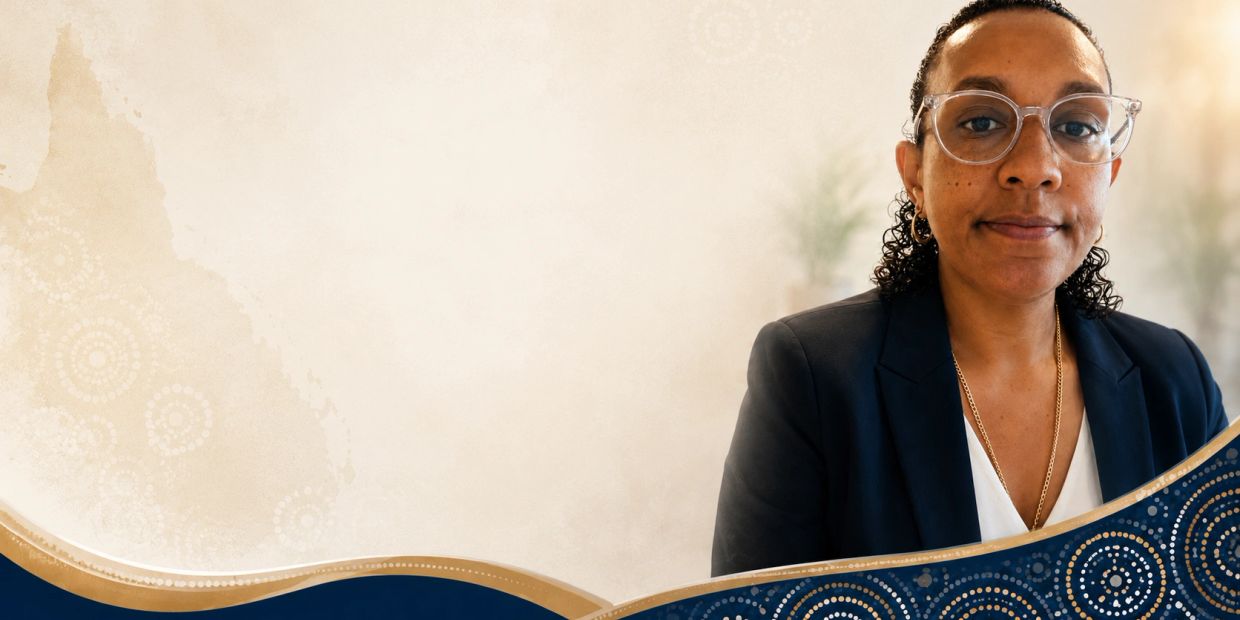 Professional woman in glasses with artistic blue and gold wave design background.