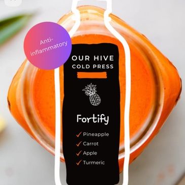 Cold-pressed Fortify juice with pineapple, carrot, apple, and turmeric.