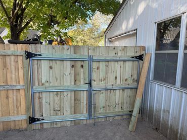 6 foot wood privacy fence installation with steel frame gates welded