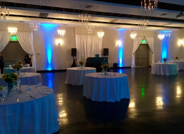 Decorative uplighting around DJ and Dance Floor.