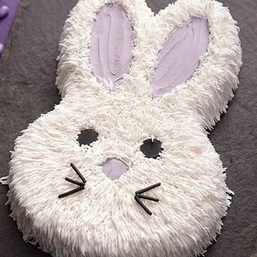 This bunny cake in the Wilton Cake Decorating style was made by All About the Cake.