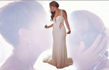 Bride in elegant white gown with romantic double exposure background.