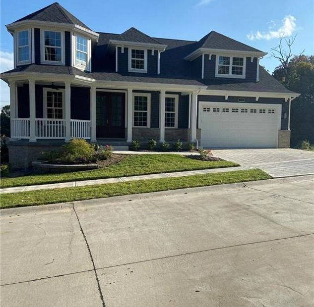 Front View of a House and an empty Road