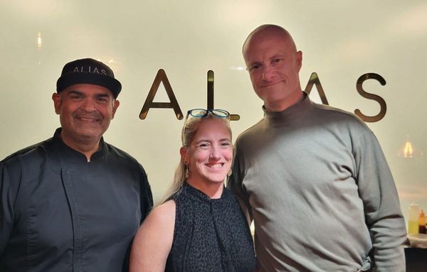 The Riningers with executive chef, Mark Valles.