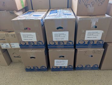 Some of our boxed quilts waiting for transport to Lutheran World Relief in Maryland.