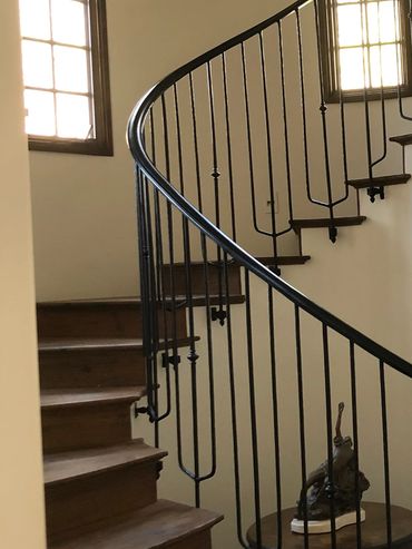 Wrought iron railing on spiral staircase