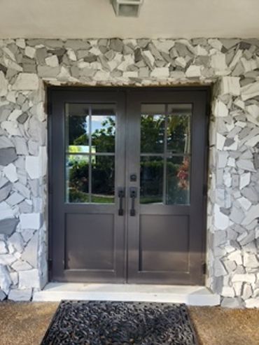 A wooden front door has classic appeal.