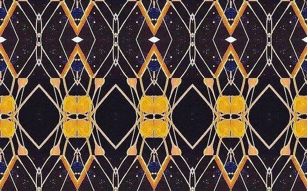 Symmetrical geometric pattern with yellow, orange, and blue accents on a dark background.