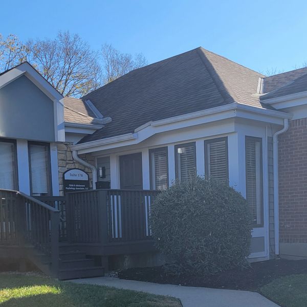Entrance to a psychology practice in a residential-style building.
