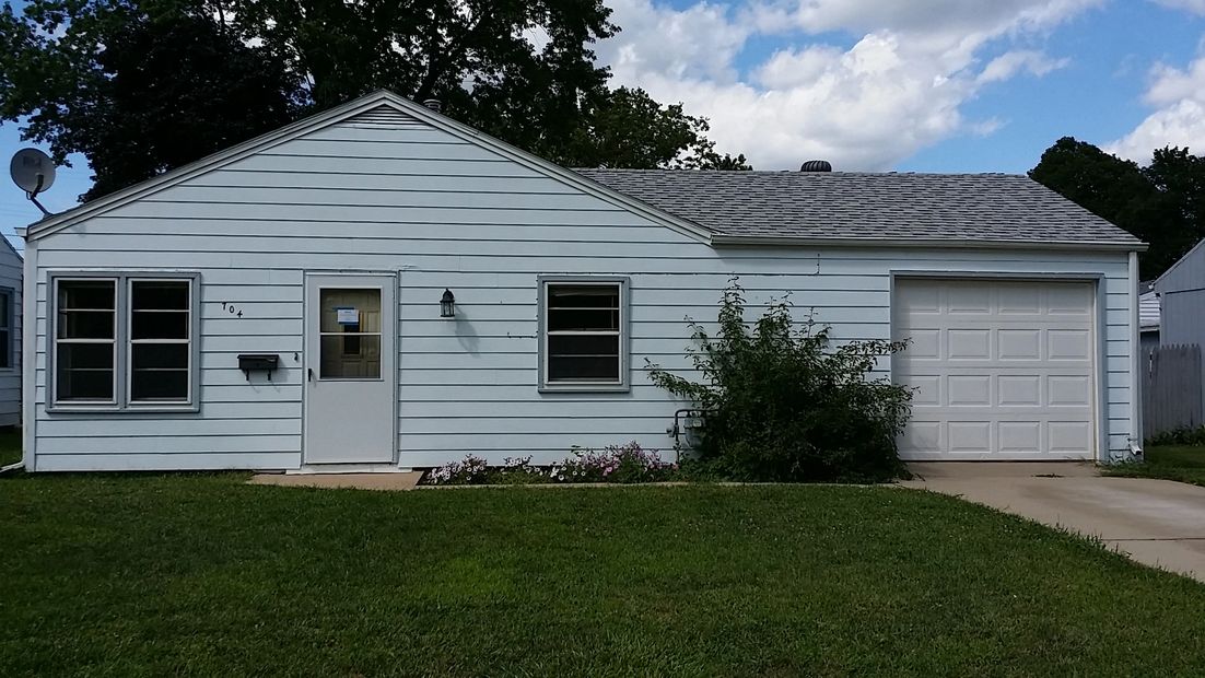 Cute 2 bedroom 1 bath home, main floor laundry, big backyard, attached garage. Broker Owned. Call fo