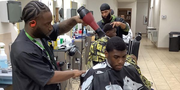 Our student applying finishing touches to his service.