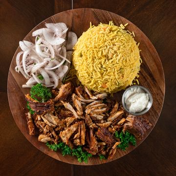 Chicken Shawarma
Marinated slices of chicken seasoned with shawarma spices and cooked on our revolvi
