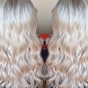 Full head of Luxury Hair Extensions. 
Method: LA Weave
Length: 20”