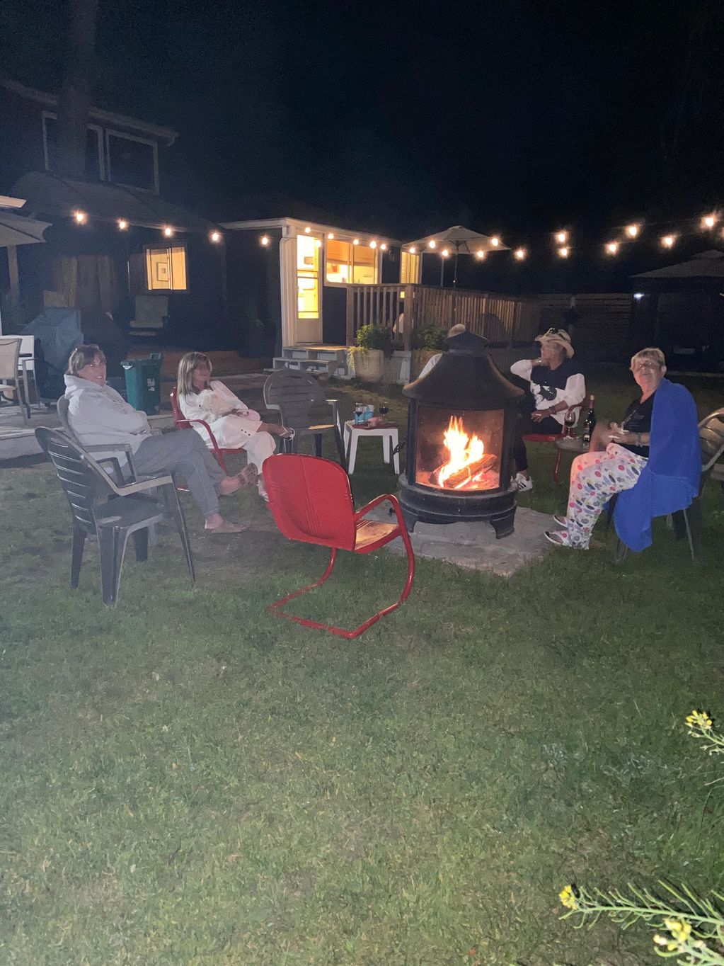 Guests enjoying the fire, enjoying stories and some lovely drinks 