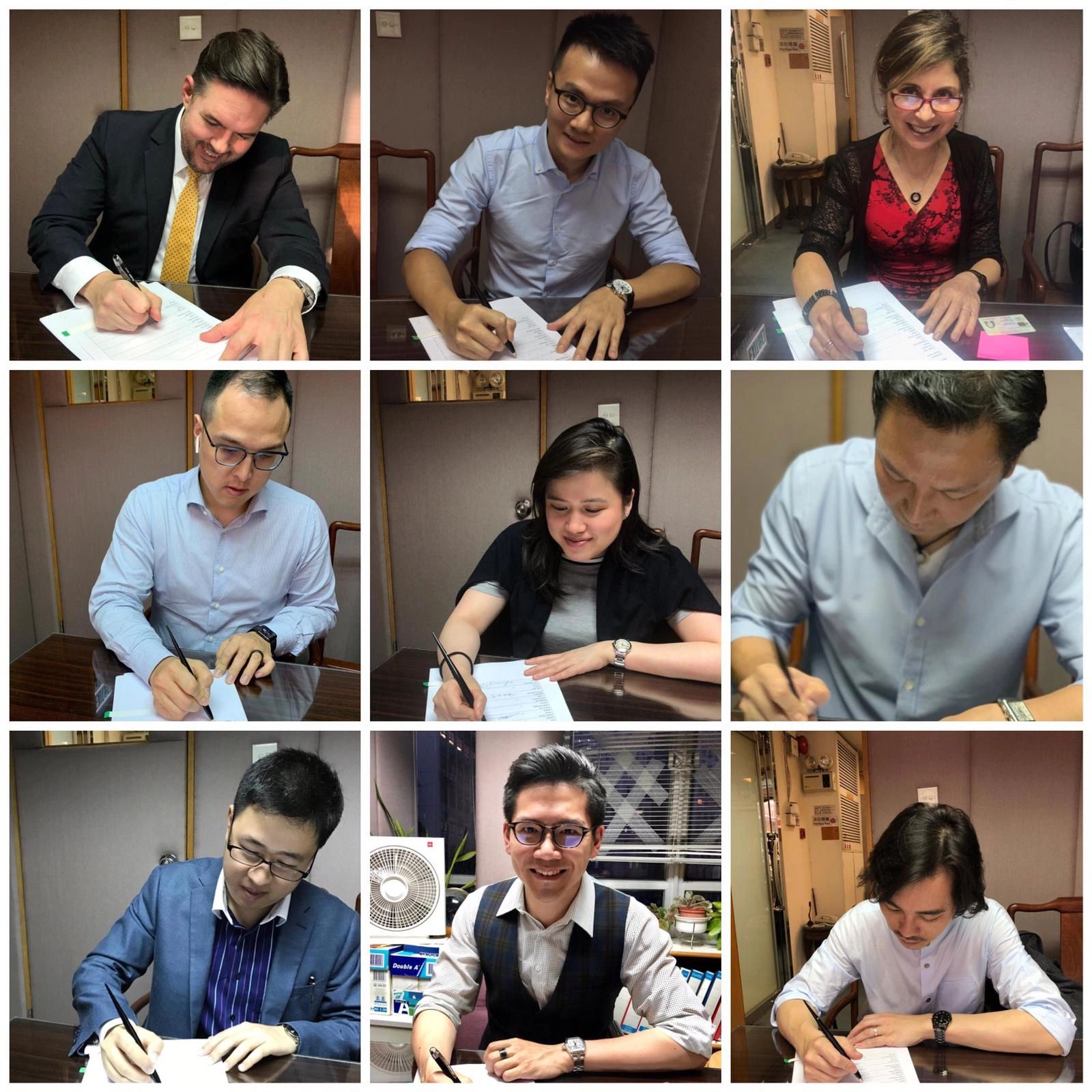 Founding Council Members of the LMCHK Society signing the organization's Articles of Association.