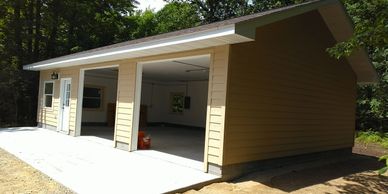 custom garage, LP Smartside, Aluminum soffit and fascia  Vector windows, Marvin window