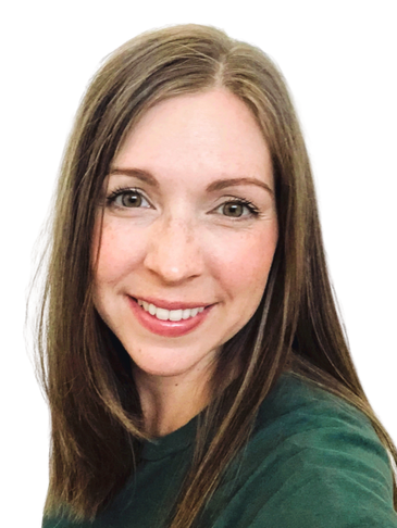 Close-up of a smiling woman with brown hair and green eyes.