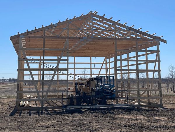 Post frame steel building