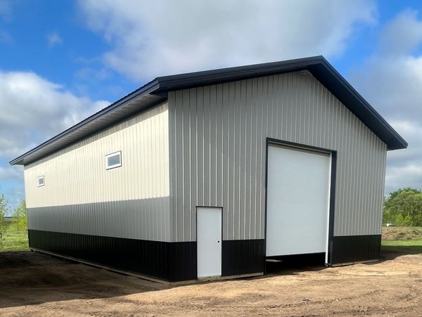 Post frame steel building