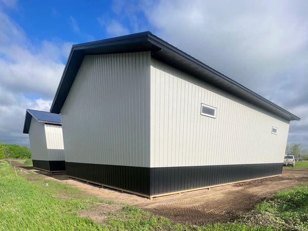 Post frame steel building