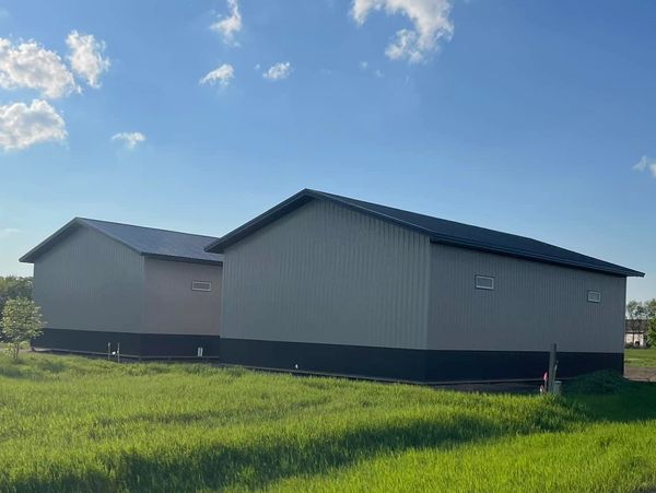 Post frame metal building storage building