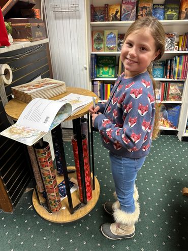 Amelie signing books at McLean and Eakin!