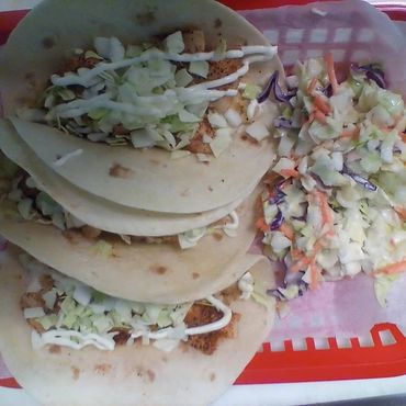 Fish and Shrimp Tacos for Eat In or Take Out shown here with our popular coleslaw