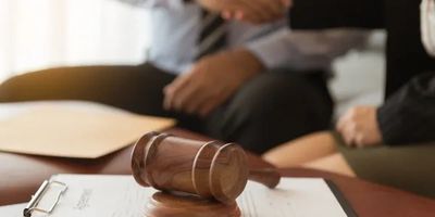 A domestic violence lawyer discussing legal rights with a client.