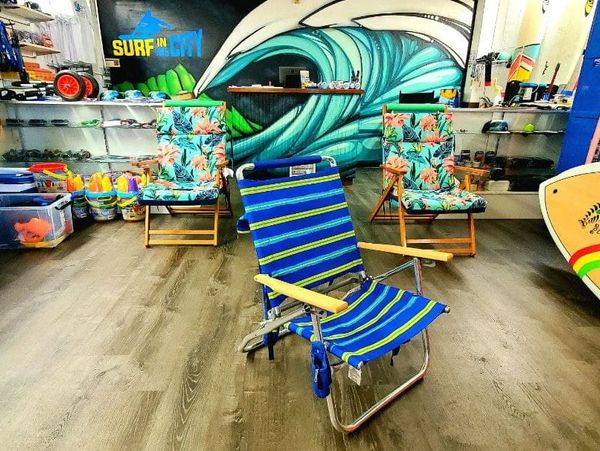 Beach chair rental in waikiki at Surf in the city waikiki beach honolulu Hawaii surfing umbrella