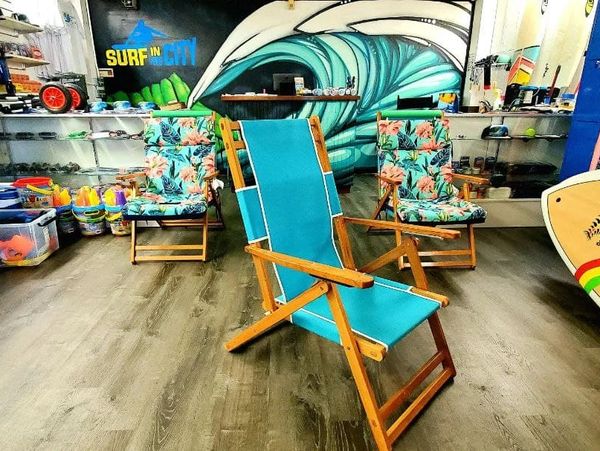 Beach chair rental in waikiki at Surf in the city waikiki beach honolulu Hawaii surfing umbrella