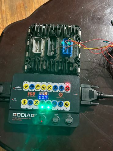 Cadillac engine control module bench top programming with automotive breakout box