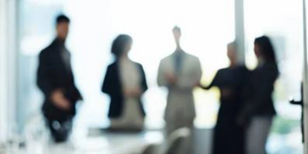 Nikki Patton hospice sales consultant in a C-Suite strategic planning meeting