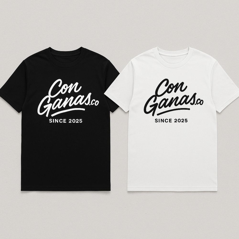Two T-shirts, one black and one white, with "Con Ganas.co Since 2025" printed.