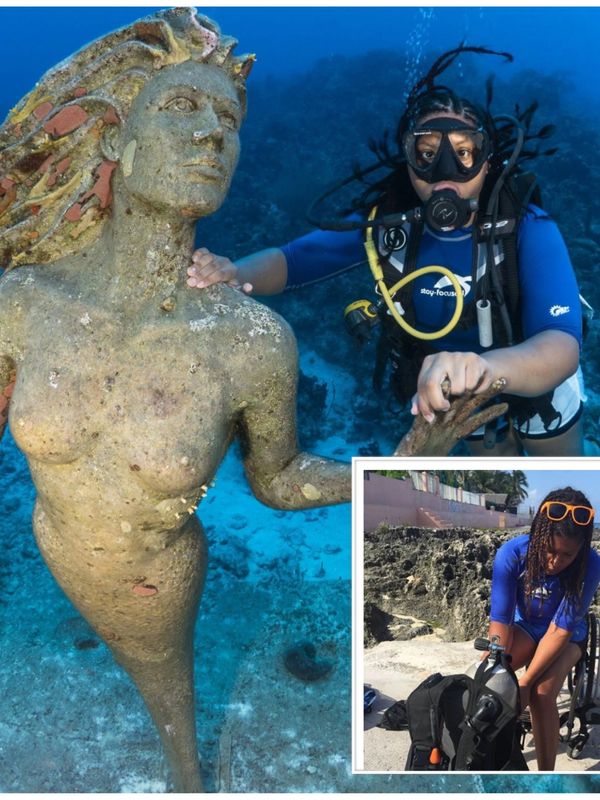 Johileny scuba diving under water she holds onto a statue. And preparing scuba gear.