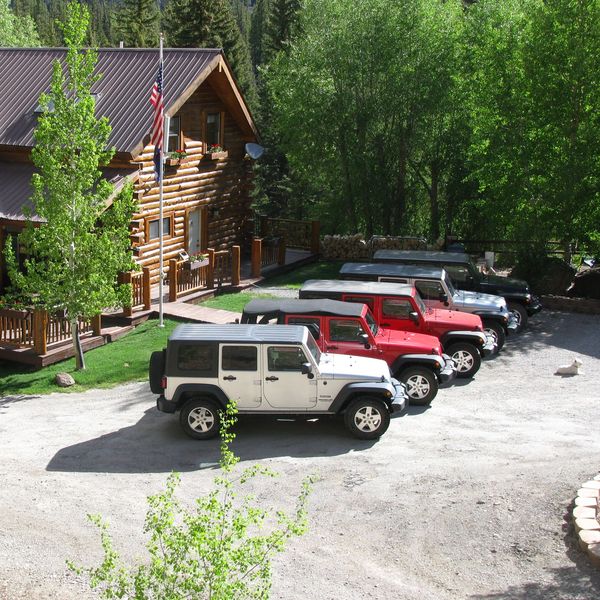 A campground with parked vehicles