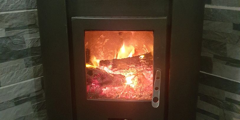 Wood burning fire for decorative purpose to demonstrate Clean Sweep chimney sweep services