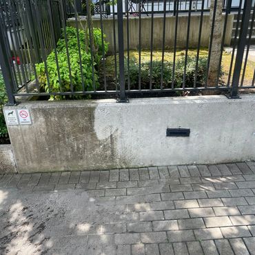 Powerwash concrete walls