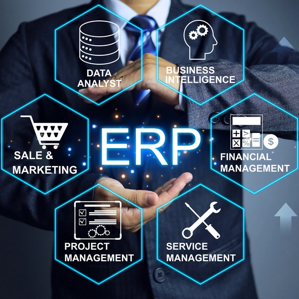 Business professional with ERP system icons representing integrated business and manufacturing data.