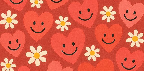 Pattern of smiling hearts and white daisies on a red background.