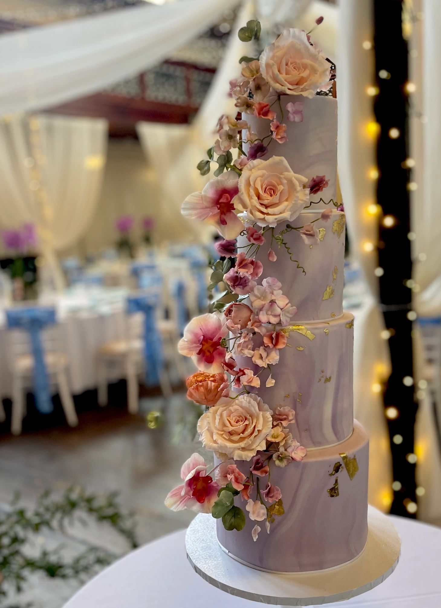Four tier lilac, ombré, marbled wedding cake with handmade sugar flowers gold leaf - Salomons Estate