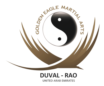Logo of Golden Eagle Martial Arts with Yin Yang symbol and eagle wings.