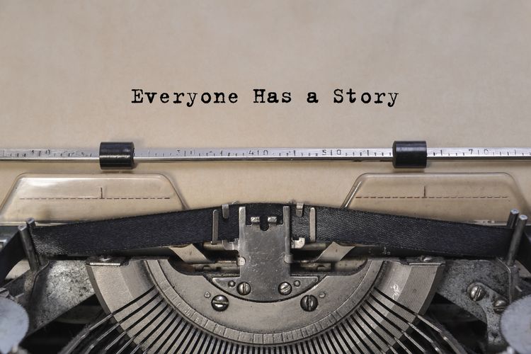 vintage typewriter that has typewritten words that say: 'Everyone has a story'