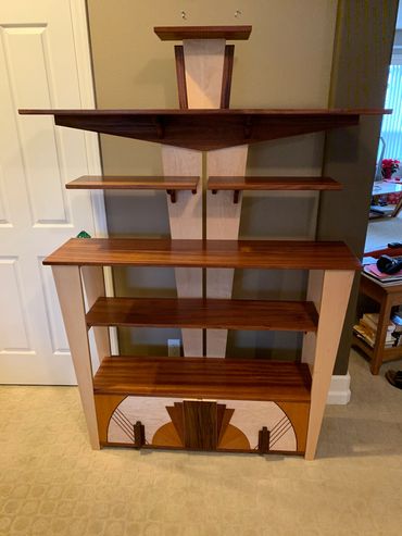 Art deco book case make from hard maple, sapele and black walnut, with some mahogany inlay.