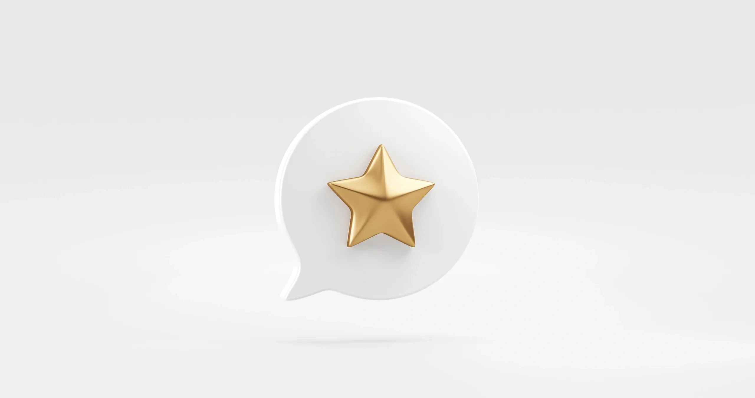 Gold star inside a white speech bubble on a plain background.