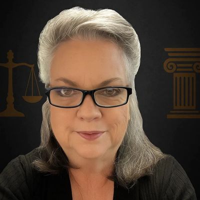 Confident woman with glasses against a background of legal symbols.