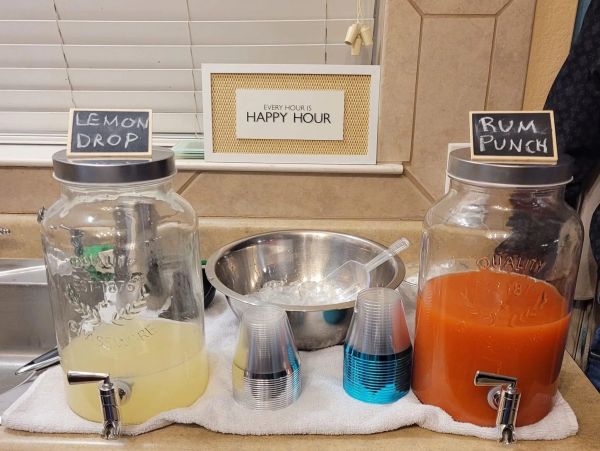 Two beverage dispensers labeled Lemon Drop and Rum Punch.
